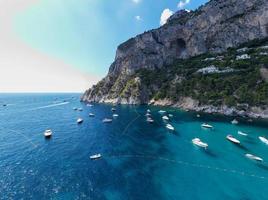 Capri Island on a beautiful summer day along the Amalfi Coast in Italy photo