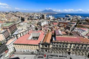 Naples, Italy - Aug 17, 2021, Aerial view of Naples, Italy, Mount Vesuvius and its harbor on the Mediterranean Sea. photo