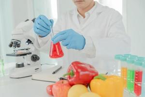 Scientist check chemical food residues in laboratory. Control experts inspect the concentration of chemical residues. hazards, ROHs standard, find prohibited substances, contaminate, Microbiologist photo