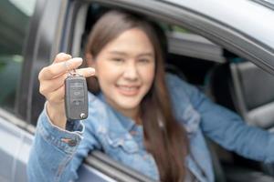 lease, rental car, sell, buy. Dealership manager send car keys to the new owner.  Sales, loan credit financial, rent vehicle, insurance,  renting, Seller, dealer, installment, car care business photo