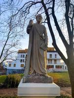 Nitra, Slovakia -01.29.2023 Statue of the Apostle Andrew in the historical center of the city. photo