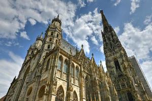 Cityscape with St Stephen Cathedral, or Saint Stephansdom Church in Old city center of Vienna in Austria. Wien in Europe. Panorama, cityscape. Travel and tourism view. Building architecture landmark. photo