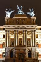 View on the Fomento Palace, the seat of Agriculture, Fisheries and Food Ministry in Madrid, Spain at night. photo