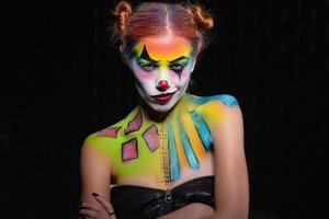 Nice lady with a face painting clown photo