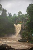 Muddy waters of a Tegenungan waterfall photo