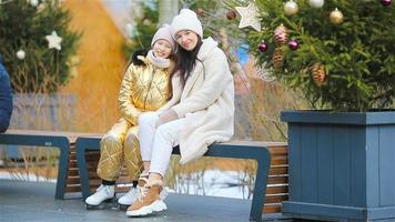 Family winter sport. Mother and daughter on winter day video