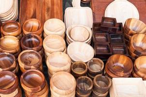 Wooden kitchen utensils at street market in thailand photo