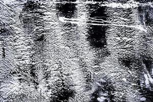 negro y blanco tonos grunge antecedentes resumen negro y blanco. textura oscuro desde incluye un efecto grietas y papas fritas. monocromo grunge textura foto