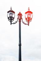 Street lamp retro on blue sky background photo