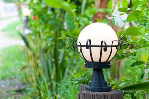 beautiful white round lanterns on the in city green park photo