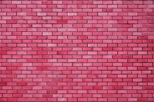 Brick wall vintage Background,pink brick wall background,Decorative dark brick wall surface for background photo