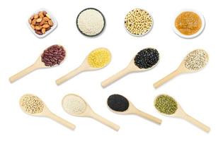 Collection set of beans and sesame on wooden spoons isolated on white background,top view photo