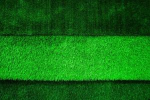 Abstract top view green color of artificial grass background texture photo