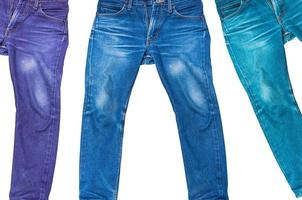 Colorful male jeans isolated on white background photo