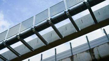 Installation of monorail train on its track elevated over road rapid railway transit system currently under construction photo