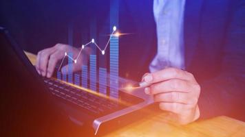 Businessman touch points symbol stock graph and chart background, concept growth and development business investment, Stock market and strategy making market plan and stock market fluctuations photo