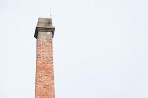 Ancient brick smokestack ,Industrial tower photo