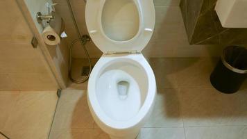Toilet bowl in a modern bathroom ,flush toilet clean bathroom photo