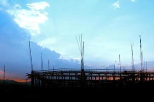 Construction site view of scaffolding poles on building site photo