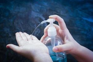 Women washing hands with alcohol gel or antibacterial soap sanitizer .Hygiene concept. prevent the spread of germs and bacteria and avoid infections corona virus photo