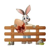 A funny bunny stands behind a rustic fence and holds a large chicken egg with a bow in its paws. Easter spring theme. Vector illustration for the holiday. Forest animals. Isolated background.