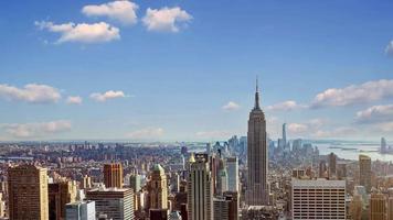 New York city skyline time lapse video from roof top with urban skyscrapers, New York, USA.