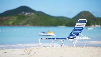 Sunbed on white tropical caribbean beach video