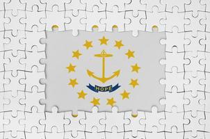 Rhode Island US state flag in frame of white puzzle pieces with missing central part photo