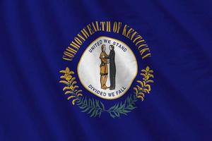 Kentucky US state flag with big folds waving close up under the studio light indoors. The official symbols and colors in banner photo