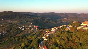 Drone video of historical Croatian town Motovun shot in the morning during sunrise