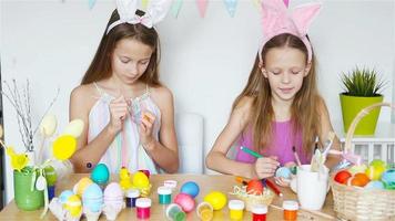 Happy easter. Beautiful little kids wearing bunny ears on Easter day. video