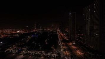Night to day timelapse video of a street in a residential area with high apartment blocks in Incheon in South Korea