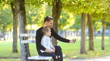 Happy family have fun taking selfie on beautiful autumn day video