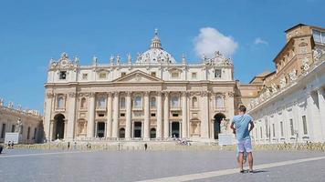 Family having fun at St. Peter's Basilica church in Vatican city, Rome. Happy travel father and little girl on european vacation in Italy. video