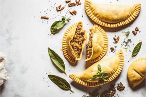 Bring a touch of sophistication to your food-related projects with our Empanadas on a white background. Showcase the rich flavors and diversity of Latin American cuisine photo