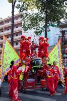 Ho Chi Minh city, Vietnam - 6 Feb 2023 Lunar New Year celebration - The dragon dance, beautiful colorful festive figure. Tet holiday background. Chinese Lunar New Year's Day, Spring Festival. photo