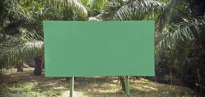 large writing board green landscapes style garden palm trees concept. photo