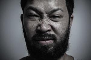 Asian handsome man angry on white background,Portrait of young Stress male concept photo