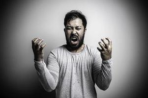 Asian handsome man angry on white background,Portrait of young Stress male concept photo