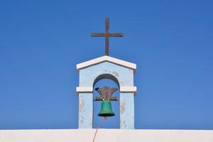 Church bell and cross photo