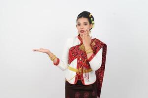 Young beautiful woman dress local culture in northern with show product gesture photo