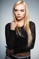 Lovely lady posing in the studio photo