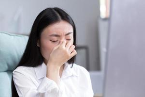 Close-up photo of business woman tired in office