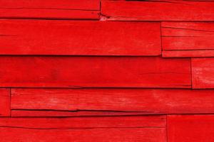 Red painted old wood textured background photo