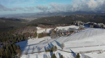 Aerial view of snowy Beskydy mountains video