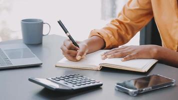 Financial analysts analyze business financial reports on a digital tablet planning investment project during a discussion at a meeting of corporate showing the results of their successful teamwork. video