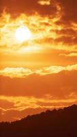 Timelapse of dramatic sunrise with orange sky in a sunny day. video