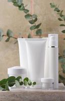 White plastic tube, jar for cosmetics. Container for gel, cream, tonic. Advertising and product promotion photo