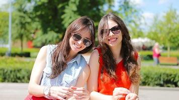 Beautiful young women portrait outdoor. Portrait of happy pretty girls smiling in the park video