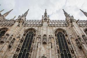 Bottom view of the spiers of Milan Cathedral photo